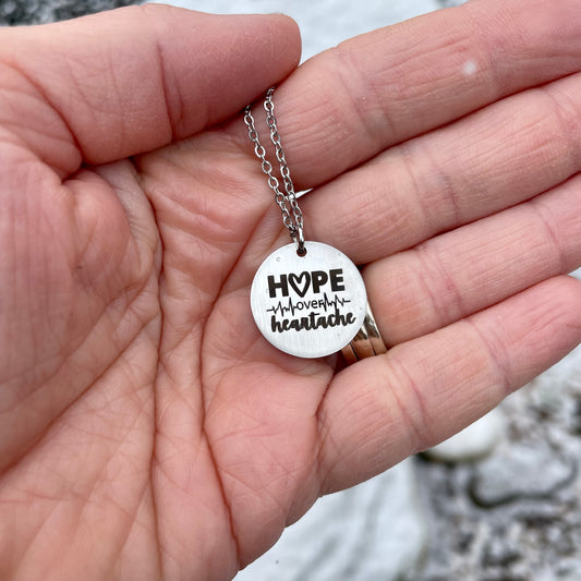 hope over heartache necklace